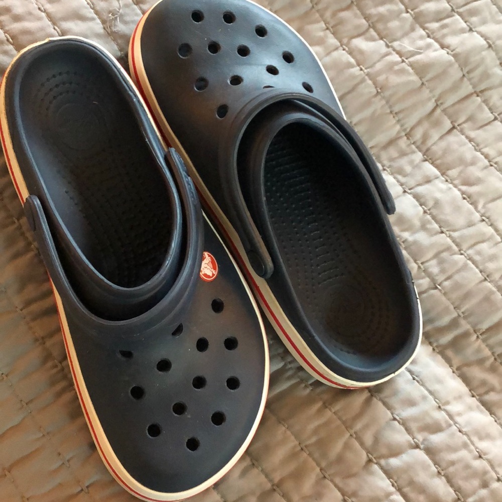 Crocs size 6 navy red and blue. Size is 7 but it’s really a 6 tbh